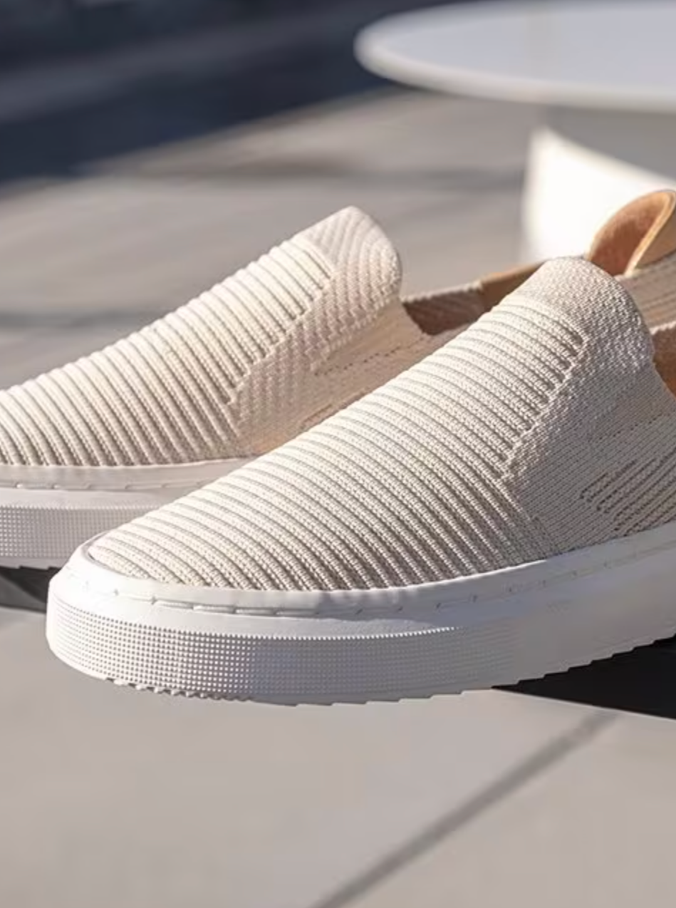 Ugg white slip on top sneakers